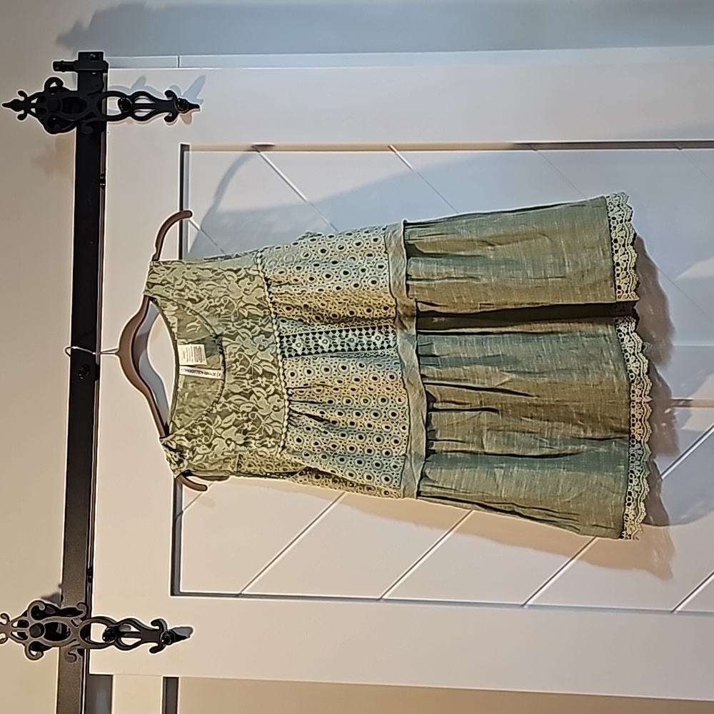 Sleeveless, sage green top